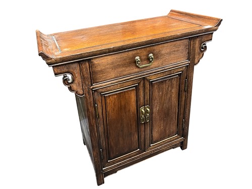 Lot 613 - A Chinese elm cupboard, the top with scrolled...