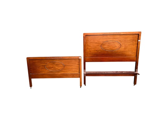 Lot 621 - A 20th century mahogany single bed, with Vono...