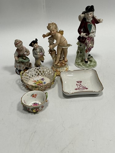 Lot 14 - Four German porcelain painted figures, circa...