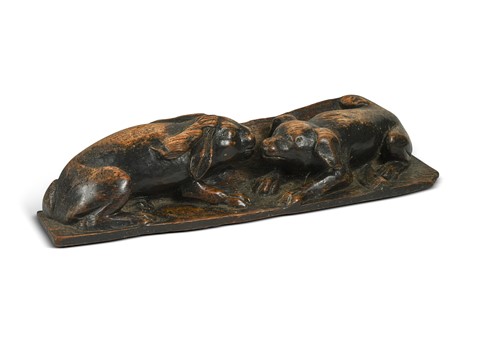 Lot 572 - An oak carving of a dog with a hare. 18th /19th century
