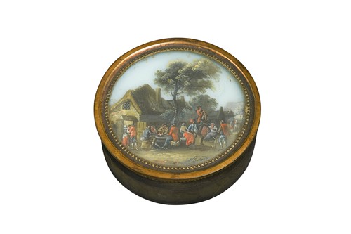 Lot 610 - A circular tortoiseshell and gilt-metal mounted snuff box and cover, 18th century