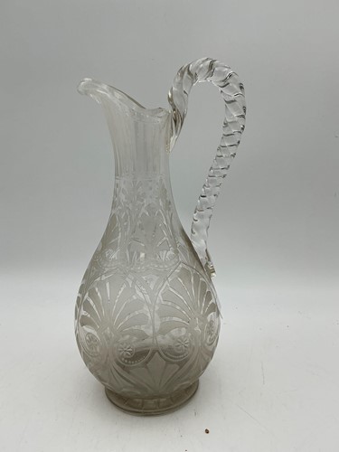 Lot 20 - A late Victorian glass ewer, with shaped...
