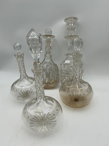 Lot 57 - Three Victorian glass decanters with Greek key...