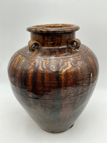 Lot 51 - A Chinese brown glazed earthenware jar, of...