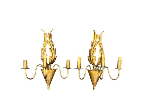 Lot 347 - A pair of French three branch gilded tole wall...