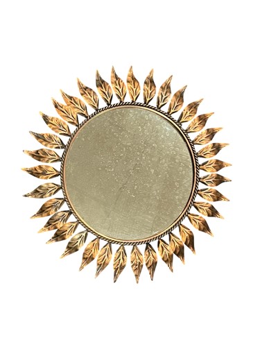 Lot 139 - A French circular wall mirror with copper...