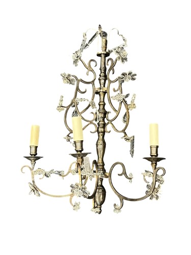 Lot 309 - A single silvered three branch wall corner...