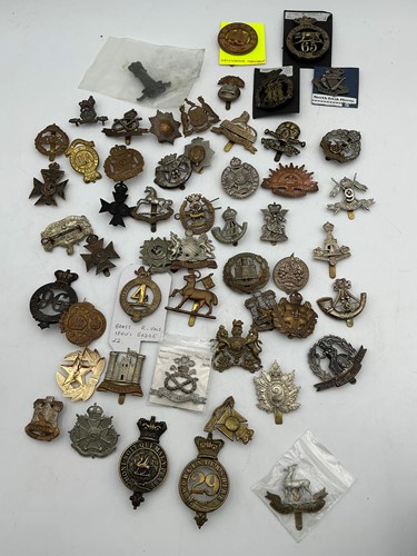 Lot 155 - A collection of over 50 Regimental metal...