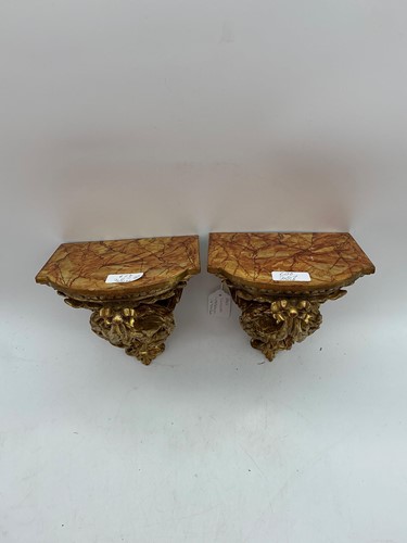 Lot 267 - A pair of 19th century giltwood wall brackets...