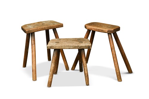 Lot 382 - Three elm seated stools, early 19th century