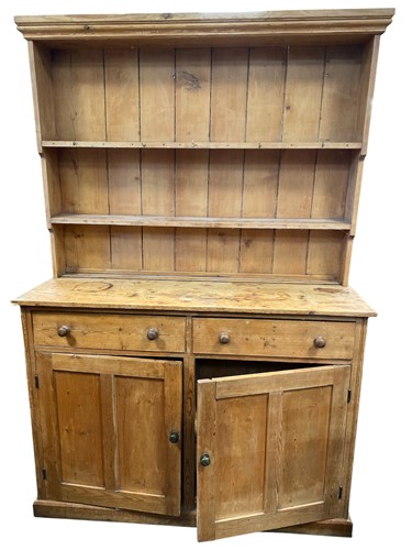 Lot 505 - An early 20th century pine dresser, the...