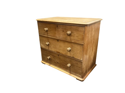 Lot 502 - A Victorian pine chest of three long drawers,...