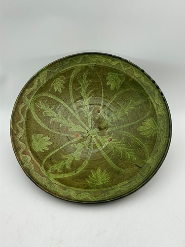 Lot 93 - A green glazed terracotta bowl, 20th...