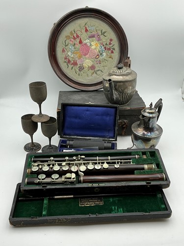 Lot 266 - A rosewood flute by Rudall Carte & Co Ltd, a...