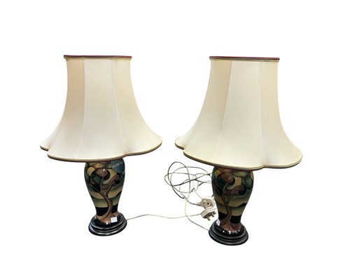 Lot 99 - A pair of Moorcroft Western Isles table...