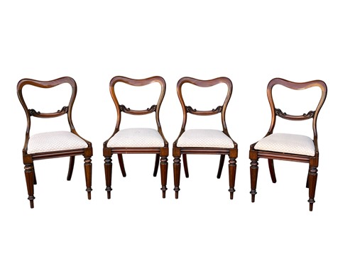 Lot 573 - A set of four Victorian mahogany balloon back...