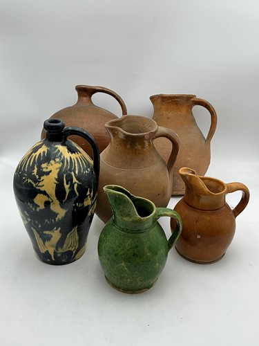 Lot 95 - Two French glazed terracotta water pitchers,...