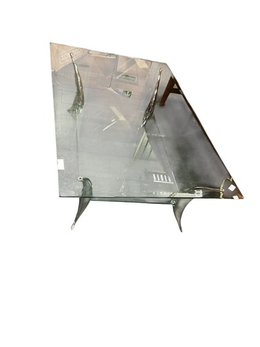 Lot 617 - A glass coffee table, late 20th century, in...