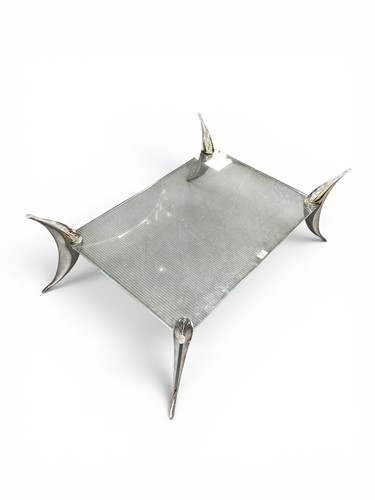 Lot 770 - A glass coffee table, late 20th century, in...