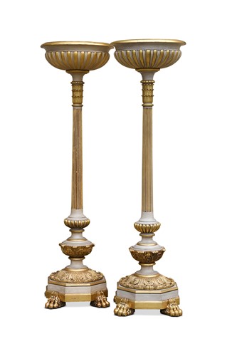 Lot 483 - A pair of white painted and parcel-gilt floor standing uplighters, 20th century