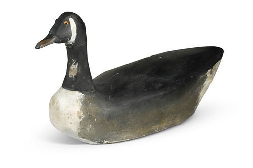 Lot 399 - A carved and painted wood Canada goose decoy, early 20th century