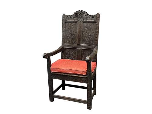 Lot 606 - A carved oak open armchair, 17th century style,...
