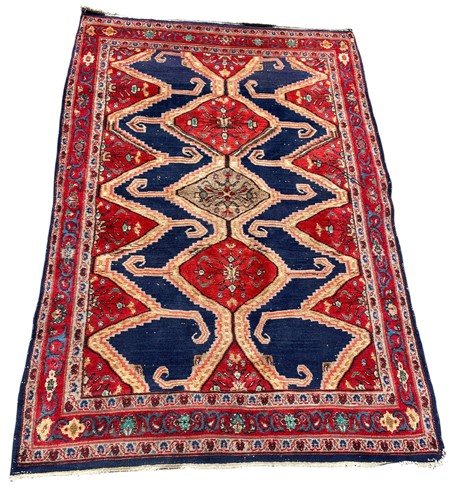Lot 446 - A hand-knotted Caucasian style rug, late 20th...