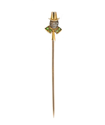 Lot 85 - A cased 'man in the moon' stick pin
