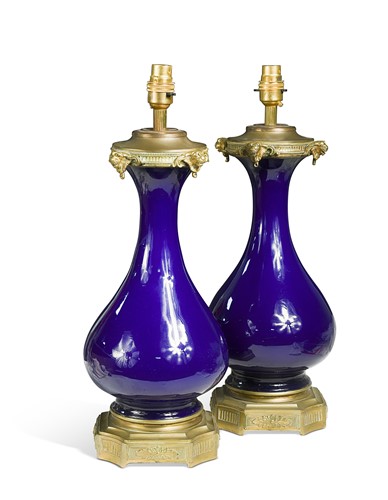 Lot 674 - A pair of French blue glaze tables lamps, 19th century and later