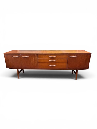 Lot 350 - A mid-century Avalon teak sideboard with three...
