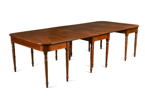 Lot 478 - A George III mahogany dining table