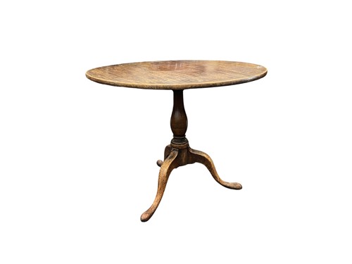 Lot 631 - A 19th century mahogany tripod table 65 x 81cm