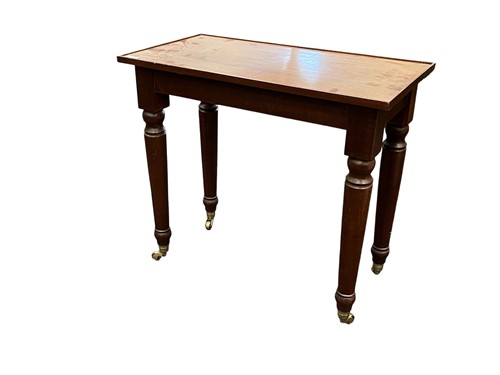 Lot 633 - A mahogany luggage stand with turned legs and...