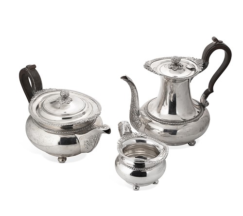 Lot 394 - A George V composed silver three-piece tea set