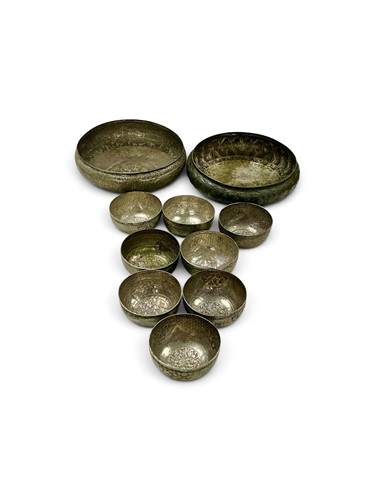Lot 348 - A set of white metal Islamic or Egyptian bowls,...