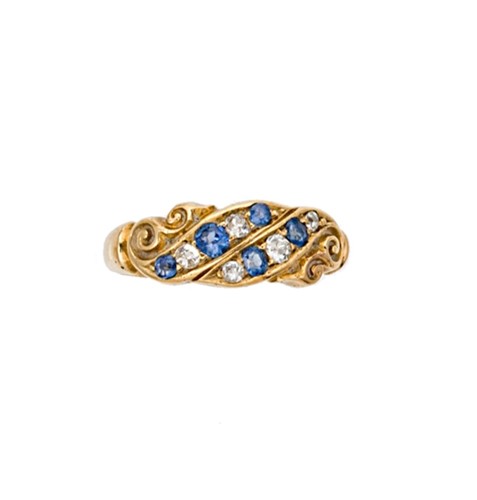 Lot 165 - An Edwardian 18ct gold sapphire and diamond ring