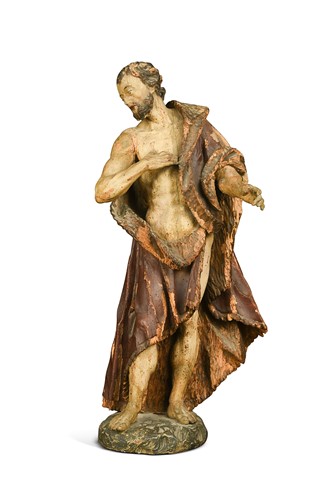 Lot 380 - A carved and polychrome decorated model of a saint, probably 16th century