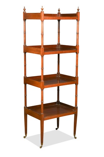 Lot 559 - A late Regency mahogany four-tier whatnot