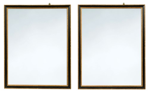 Lot 678 - A pair of Hogarth style ebonised and parcel-gilt framed mirrors, 20th century