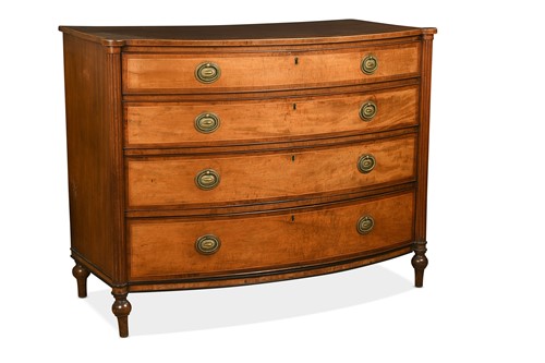 Lot 500 - A Regency satinwood and mahogany bow-front chest of drawers