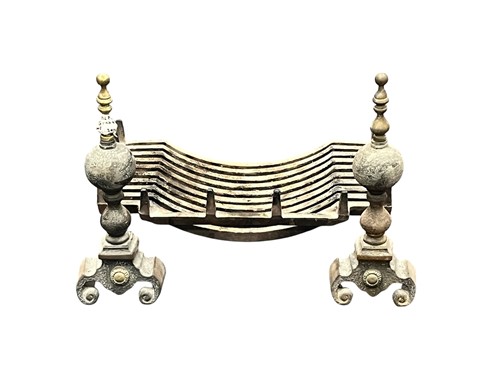 Lot 599 - Wrought iron fire grate and dogs with brass...