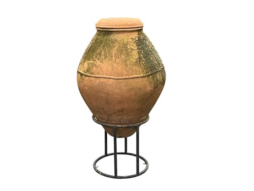 Lot 772 - An earthenware flagon on stand 100cm high...