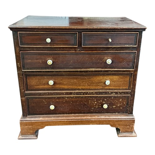 Lot 186 - A 19th century miniature mahogany chest of...