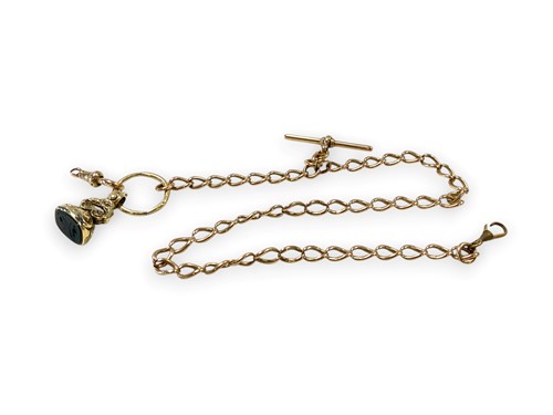 Lot 208 - A curb chain with 'T' bar, tested as 9ct gold,...