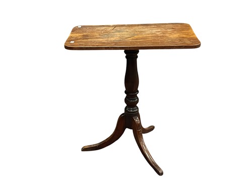 Lot 587 - A mahogany tilt-top tripod table, 19th century,...