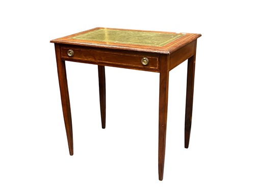 Lot 730 - A reproduction mahogany writing table