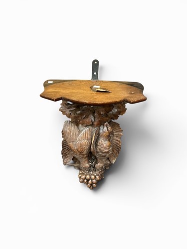 Lot 122 - A Victorian carved oak wall bracket, modelled...