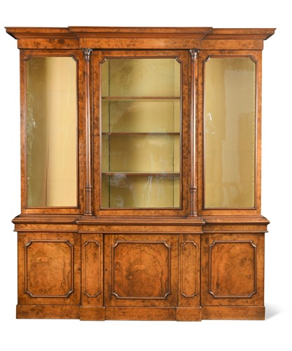 Lot 685 - A Victorian walnut breakfront bookcase