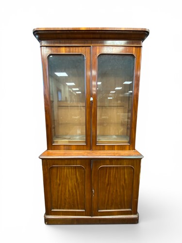 Lot 387 - A Victorian mahogany glazed bookcase cabinet...