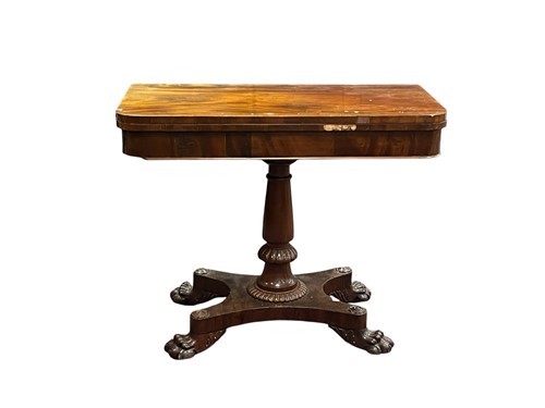 Lot 661 - A Regency mahogany fold over card table on...